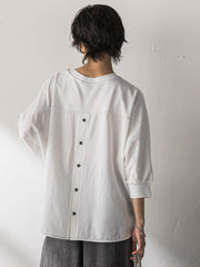 ポンチローマBACK釦ドッキングプルオーバー