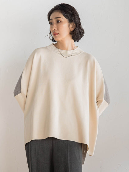 【WEB限定】”前後で印象が変わる”ドルマンバイカラーニット