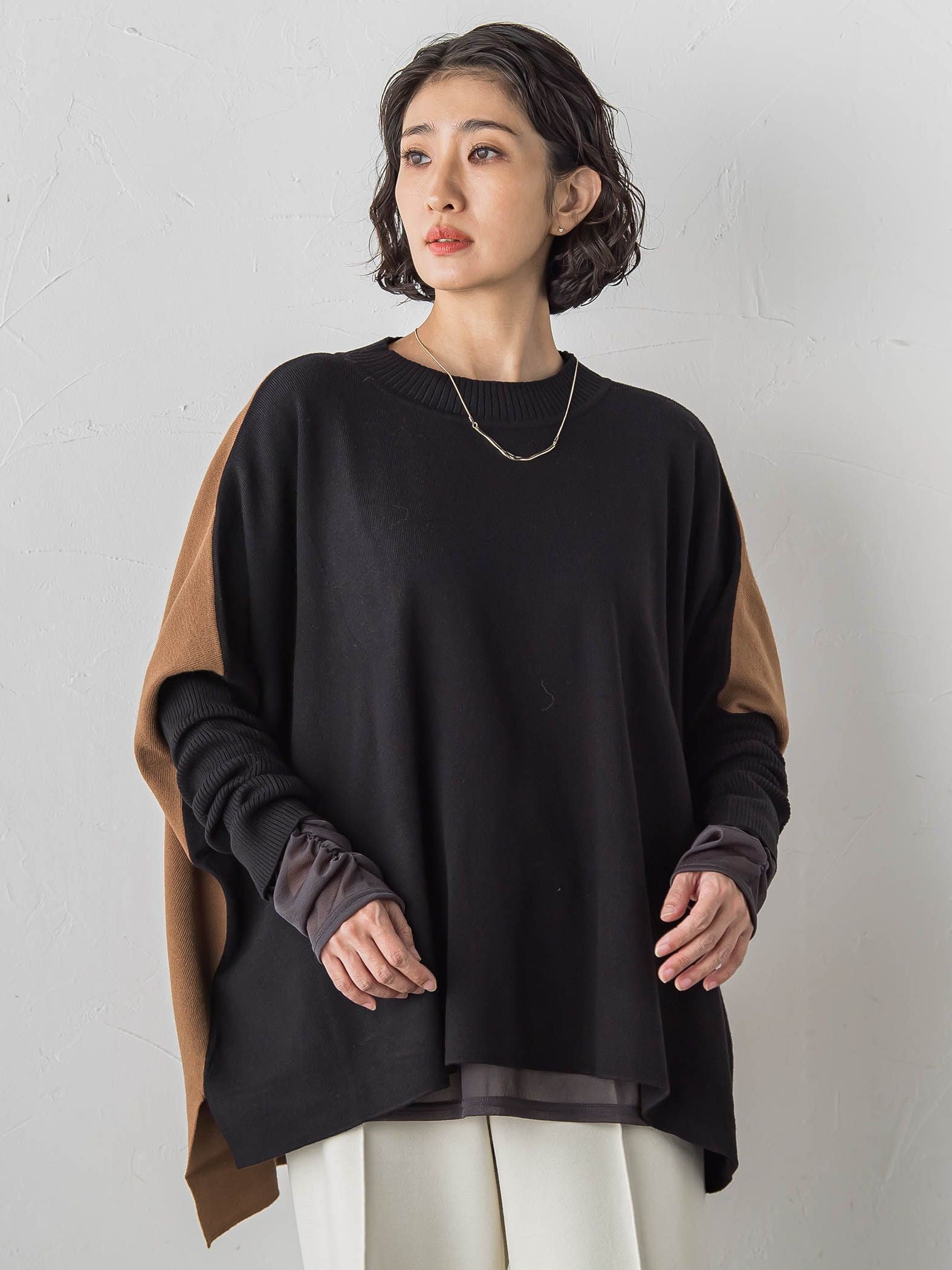 【WEB限定】”前後で印象が変わる”ドルマンバイカラーニット