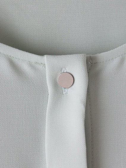 メランジツイルノーカラーブラウス