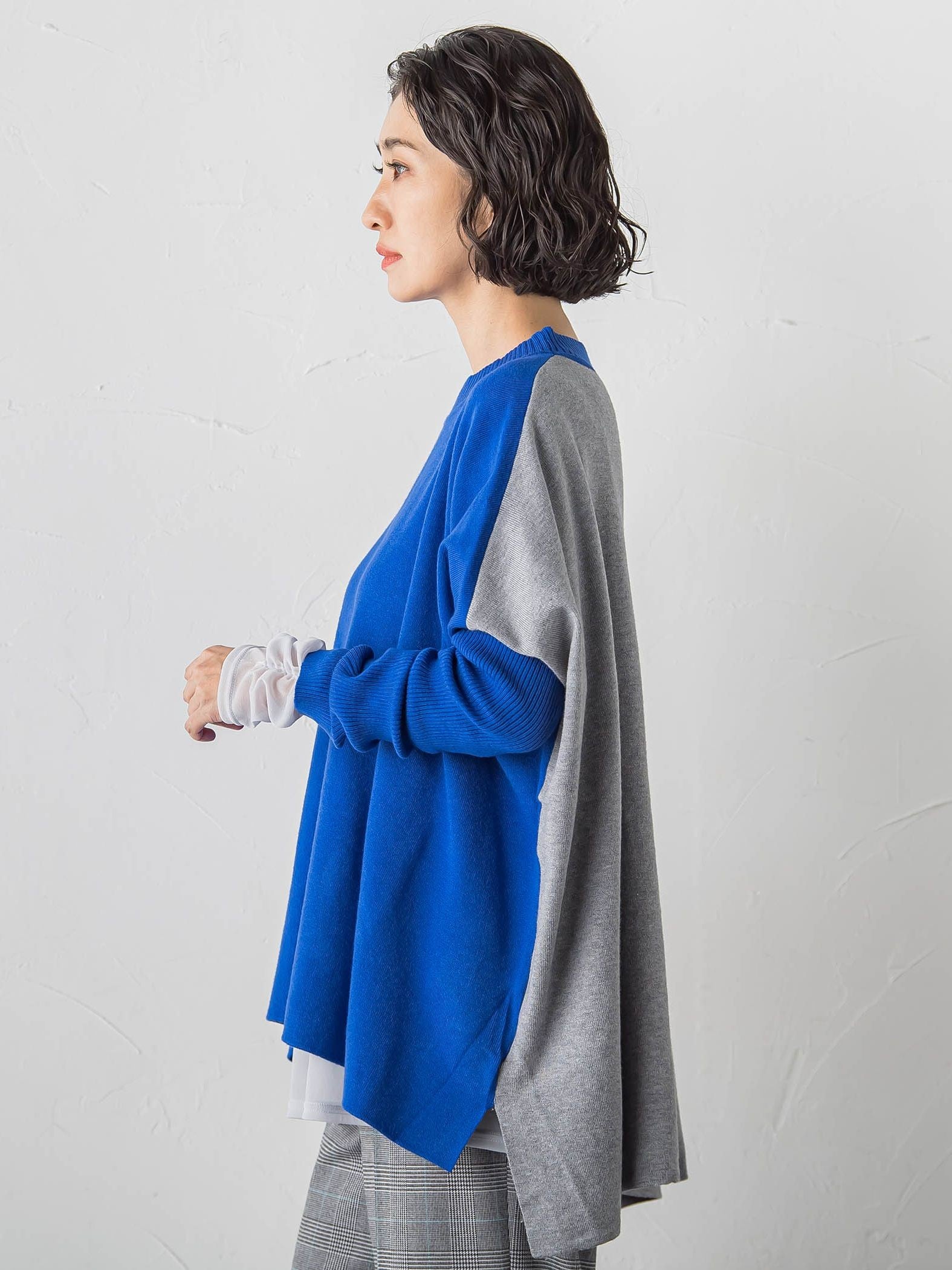 【WEB限定】”前後で印象が変わる”ドルマンバイカラーニット